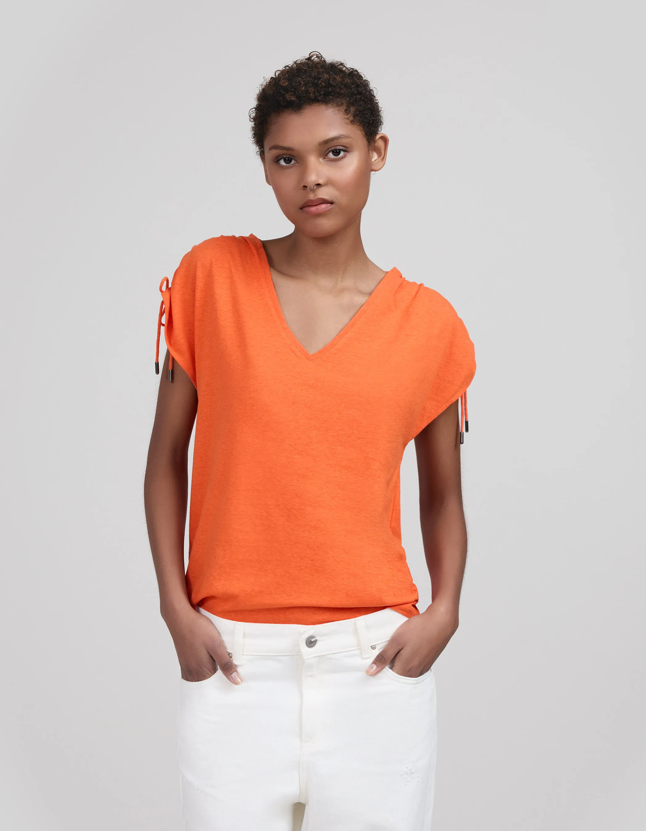 Tee-shirt orange coulisses épaules Femme