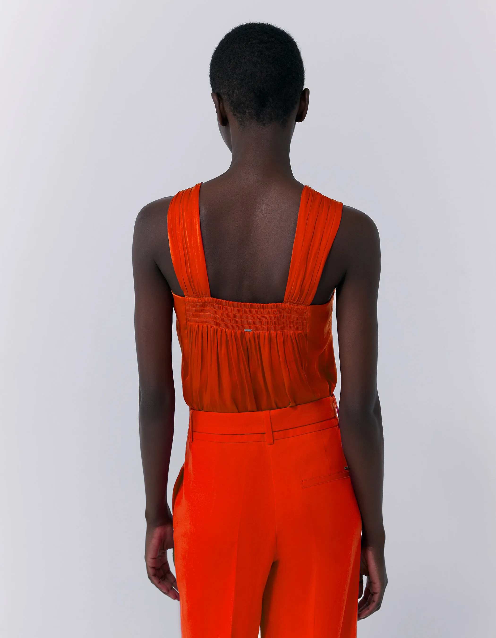 Top asymétrique à encolure nouée orange femme